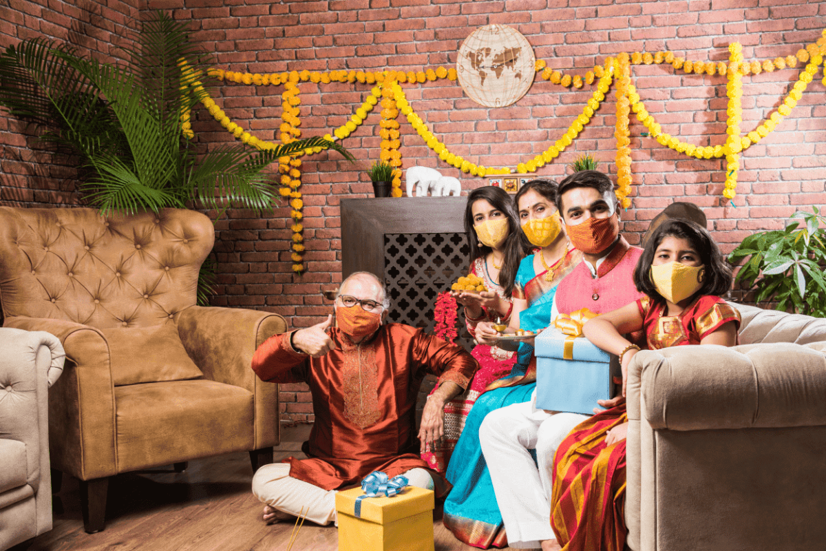 What are the specific Covid-19 precautions to be taken during Diwali while meeting elders?